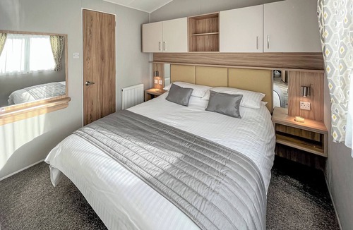 Llwyngwril House | Additional sleeping for two in the lounge area.