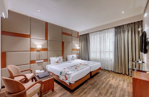Girgaon Hotel | Adiva Residency Beacon, Grant Road, Mumbai