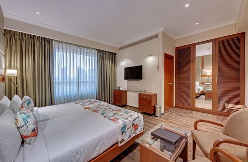 Girgaon Hotel | Adiva Residency Beacon, Grant Road, Mumbai