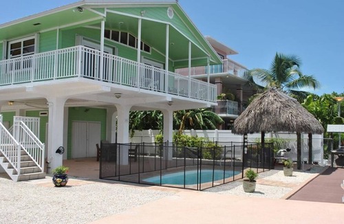 Sunshine Estates House | Adorable canal front Pool Home in Plantation Key
