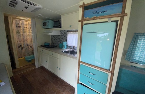 Milton RV Rental | Adorable (RENOVATED) Vintage Camper, good for stays of a few nights to a week for 2-3 people - possibly for a family of 4 with 2 SMALL children. Staying here entitles you to use of all the park's amenities.