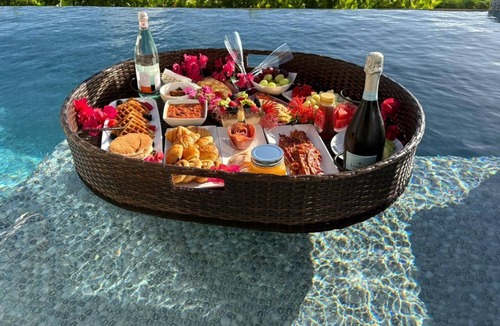 Saint George Parish Cottage | Affordable luxury, with runway views and tropical breeze.