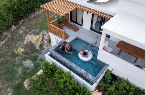 Saint George Parish Cottage | Affordable luxury, with runway views and tropical breeze.