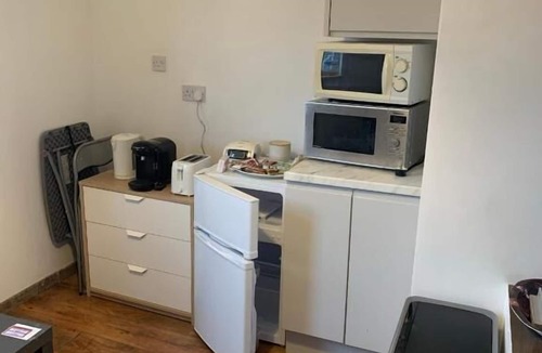 Coventry House | Affordable Suites