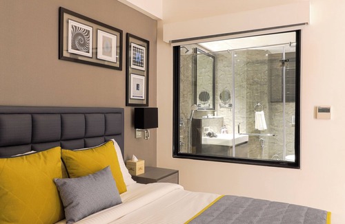 DLF City Hotel | AIR by Ahuja Residences