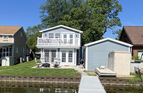 Manitou Beach-Devils Lake House | Airy, updated family cottage on all-sports lake