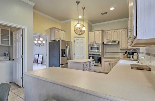 Travis Landing Villa | Airy Villa in Austin w/ Badminton/Volleyball Court