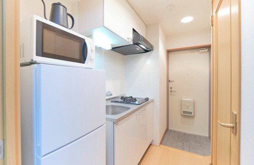 Toshima Apartment | alba cerezo by Tranova