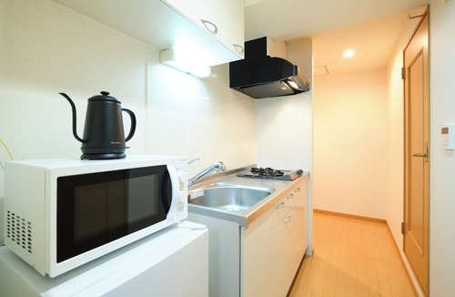 Toshima Apartment | alba cerezo by Tranova
