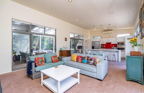 Mangawhai Heads House | All Decked Out - Modern holiday home with great covered outdoor entertaining space in handy location