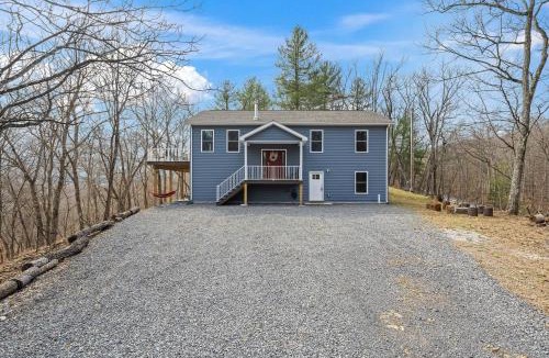 Great Cacapon House | All Decked Up - wifi, view, river access, fire pit, 3 bedrooms, games, family friendly