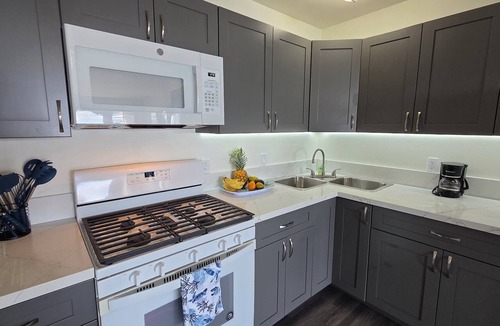 Ualapue Condo | All New Remodel of A213 - king bed, AC, kayaks, beach gear, pickleball and more!