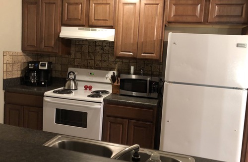 Elk City Condo | All the Comforts of Home Duplex. Backyard grill and atmosphere. Extra services!
