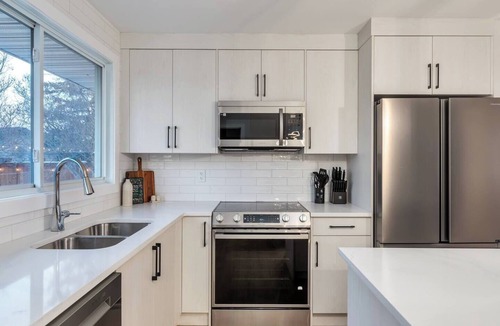 Southeast Calgary House | Alpine Elegance | Modern 5-BR | 2 Full Kitchens!