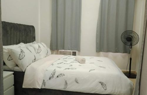Wack-Wack Greenhills Apartment | AMA Tower Residences - Liam Kyro Staycation Place
