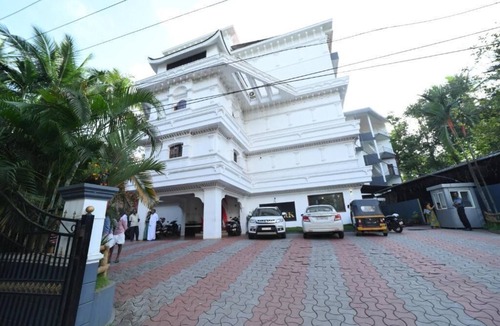 Thalassery Hotel | AMAN Residency