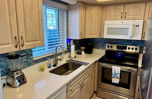 Seaside Homes Condo | Amazing 2-bedroom beachfront condo on Ormond Beach steps from pool and beach.