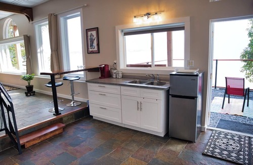Vananda House | Amazing views, private, spacious, waterfront with fire table, luxury furniture.