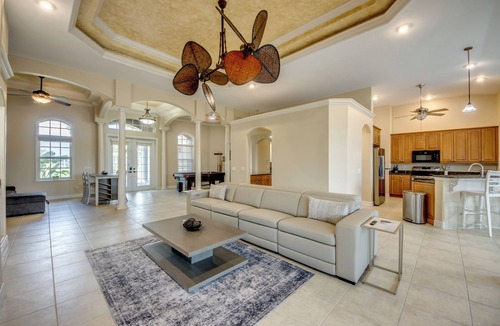 Fort Myers Villa | Ample 3 BR/3 bath waterfront Villa with 2 suites, heated pool, kayaks, pool table, fishing poles