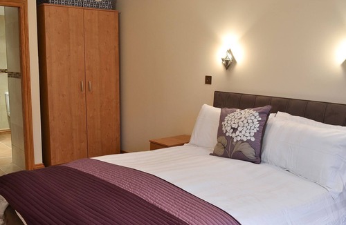 Ruddington Cottage | An open plan first floor apartment in the seaside resort of Beadnell.