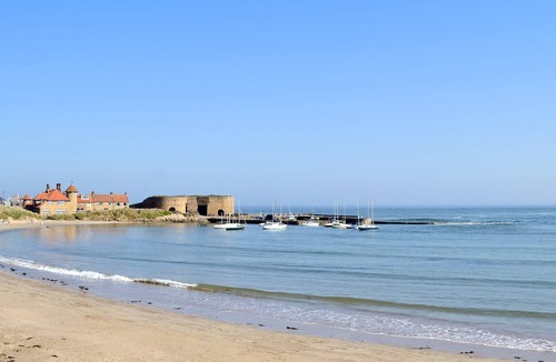 Ruddington Cottage | An open plan first floor apartment in the seaside resort of Beadnell.