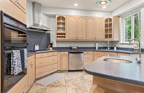 Sand Lake Villa | Anchorage Group Retreat | Dual King Suites + Theatre & Game