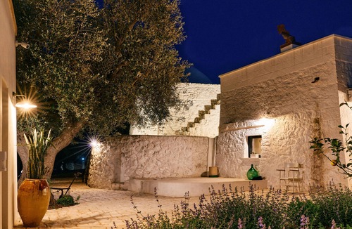 Ostuni Villa | Ancient trullo with swimming pool in Ostuni. Elegant residence among the olive trees.