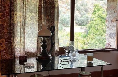 Calci House | Ancient Tuscan style country house with a view of the Pisan Mountains