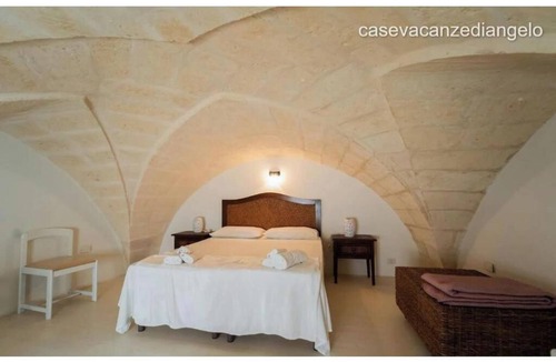 Uggiano la Chiesa Bed & Breakfast | Anemone Studios - Double room with extra bed in Salento