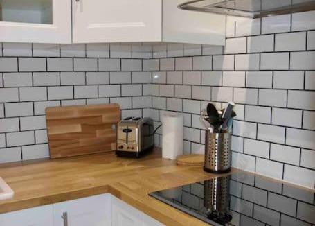15th Arrondissement Apartment | Another brick in the wall Apartment in Paris Sleeps 9