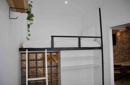 15th Arrondissement Apartment | Another brick in the wall Apartment in Paris Sleeps 9