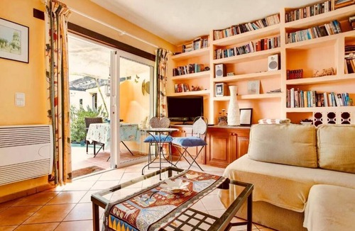 Teguise Apartment | Apartment 1 with panoramic window in the bedroom facing the sea and Risco Famara