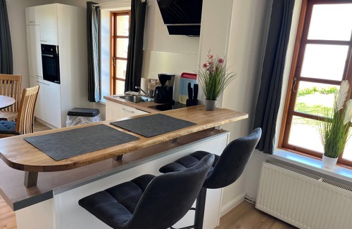 Stove Apartment | Apartment 3 with 1 bedroom (2-4 pers.) upstairs/1 pet allowed - Villa Seeheim Ferienobjekt