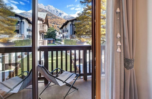 Bormio Apartment | Apartment "Baita Emilia e Daniele 11" with Mountain Views, Balconies, and Wi-Fi