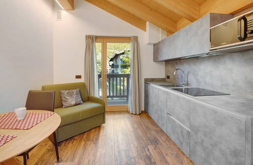 Bormio Apartment | Apartment "Baita Emilia e Daniele 12" with Mountain Views, Balconies, and Wi-Fi