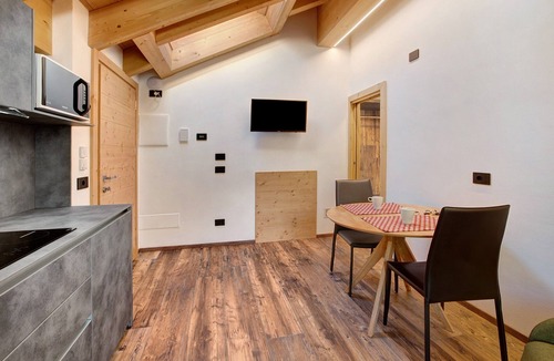 Bormio Apartment | Apartment "Baita Emilia e Daniele 12" with Mountain Views, Balconies, and Wi-Fi