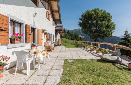 Roncone Apartment | Apartment "Baita Località Cap" with Garden & Mountain View