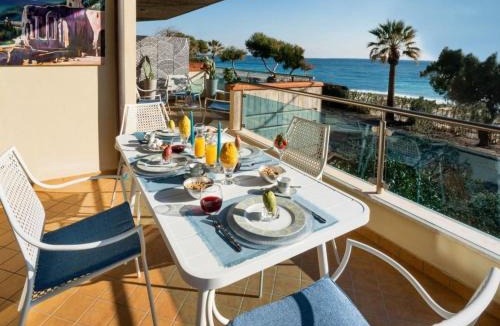Mazzeo Apartment | Apartment Beachfront Apartment by Interhome