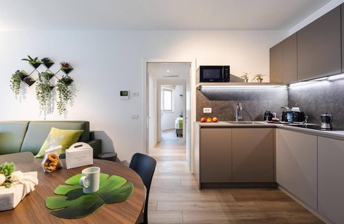 Torbole sul Garda Apartment | Apartment 'Boutique Red' with Balcony, Wi-Fi and Air Conditioning