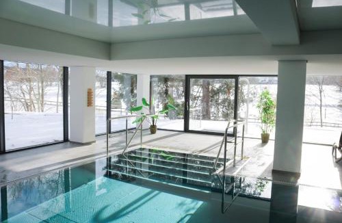 Schluchsee Apartment | Apartment Caroline - Gemütliche Ferienwohnung mit Pool & Sauna