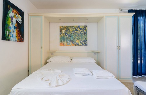 Neviano House | Apartment 'Core Resort - Familiare Bianca' with Shared Pool, Wi-Fi and Air Conditioning