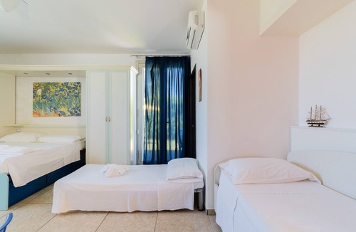 Neviano House | Apartment 'Core Resort - Familiare Bianca' with Shared Pool, Wi-Fi and Air Conditioning
