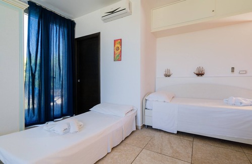 Neviano House | Apartment 'Core Resort - Familiare Bianca' with Shared Pool, Wi-Fi and Air Conditioning
