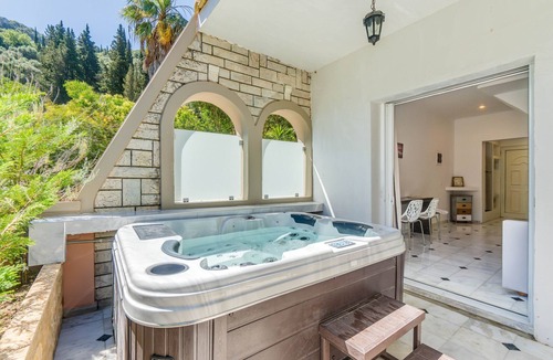 Agios Gordios Apartment | Apartment 'Doliva John' with Private Hot Tub, Mountain View, and Air Conditioning