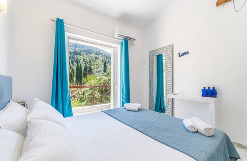 Agios Gordios Apartment | Apartment 'Doliva John' with Private Hot Tub, Mountain View, and Air Conditioning
