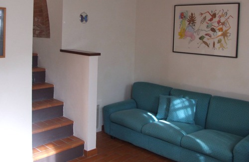 Santarello House | Apartment for couple in a farmhouse with swimming pool on the hills of Siena