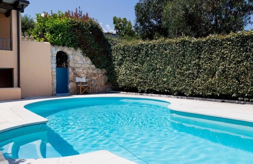Luddui Apartment | Apartment "Ida Isuledda 1" with Pool, Garden & Wi-Fi
