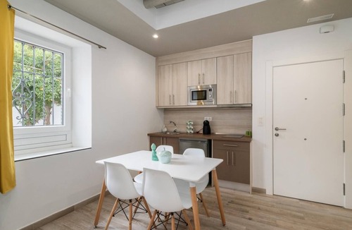 Cervantes Apartment | Apartment in a restored mansion in Granada.