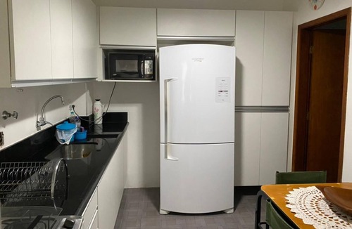 Parque Enseada Apartment | Apartment in Enseada - 2 suites + 1 bedroom with air conditioning and WIFI