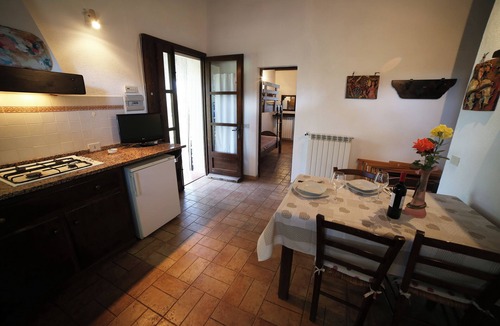 Castagneto Carducci Apartment | Apartment with pool in a family farmhouse on the Tuscan coast.